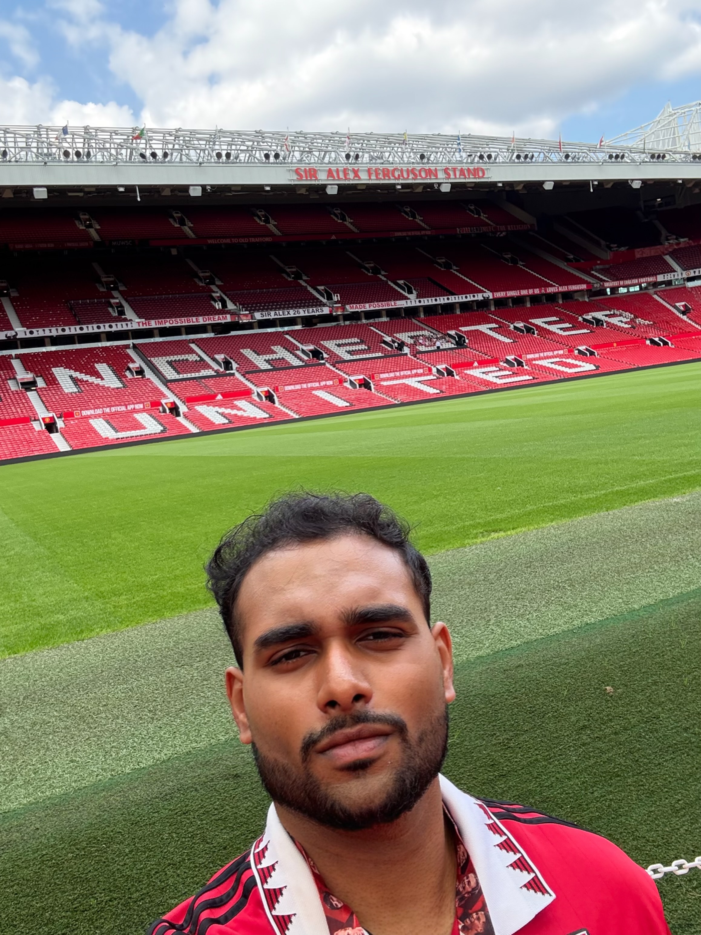 Vishal on the pitch at Old Trafford, Manchester United's stadium